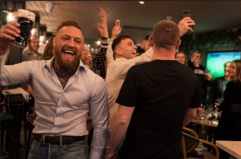 MMA star Conor McGregor surprises patrons at a Dublin pub with a massive €20,000 Christmas gift. Get the details on his festive gesture