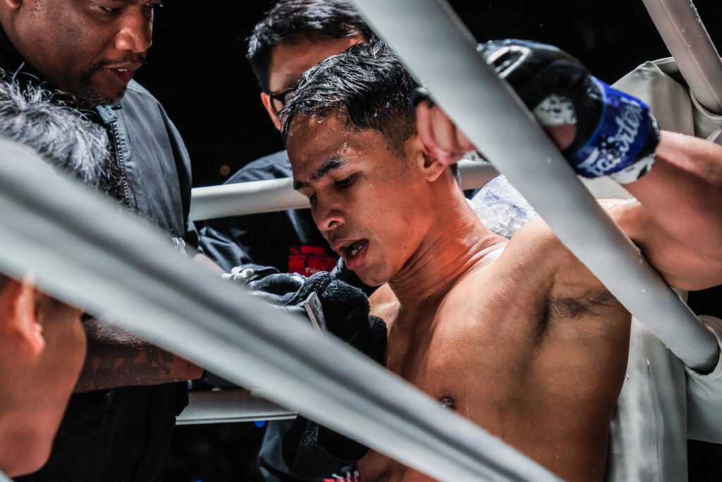 Superbon sitting on his stool between rounds at a ONE championship event